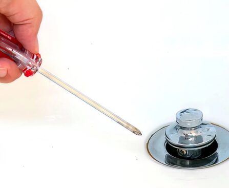 How do you remove a bathtub drain stopper?