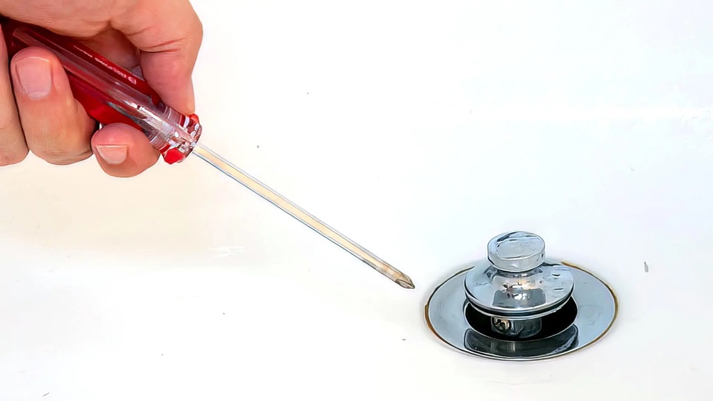 How do you remove a bathtub drain stopper?