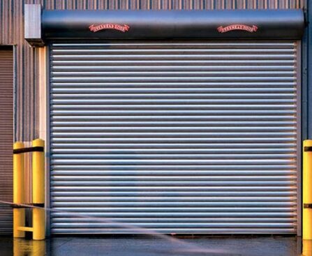 What is the disadvantage of roll-up doors?