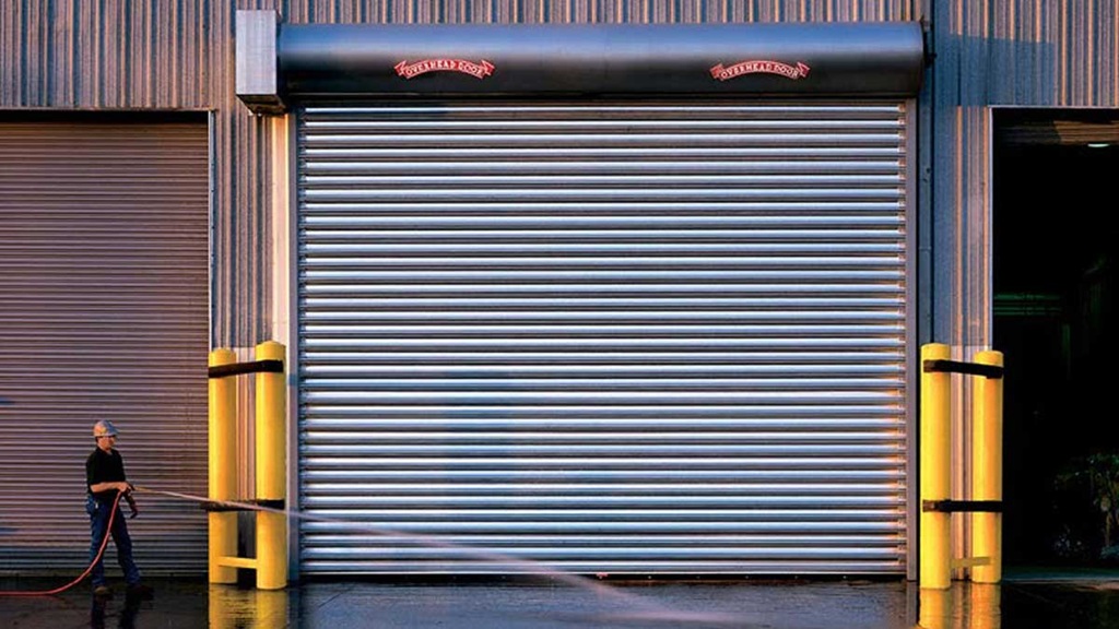 What is the disadvantage of roll-up doors?