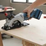 G LAXIA mini circular saw cutting plywood with laser guide visible