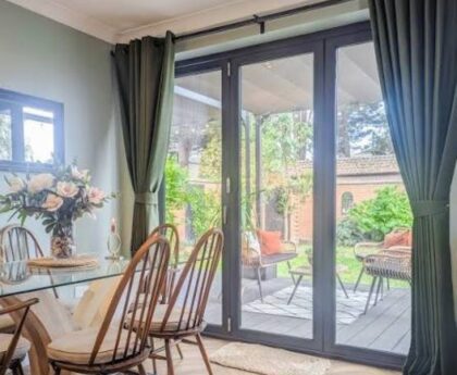 Stylish curtain setup for sliding doors in a bright and cozy home interior