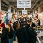 Shoppers browsing handmade jewelry and ceramics at the One of a Kind Holiday Show 2026 on the 7th Floor of the Merchandise Mart in Chicago, Illinois